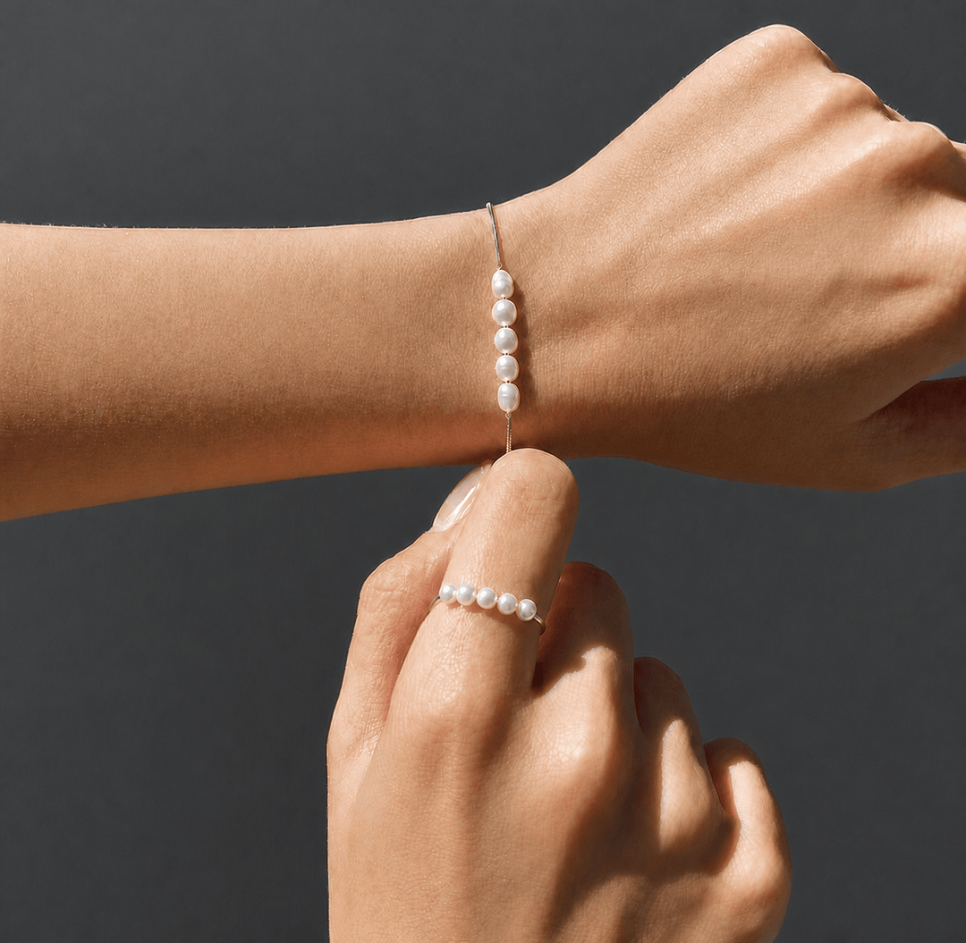 Adella stainless steel pearl fidget bracelet with five movable pearls